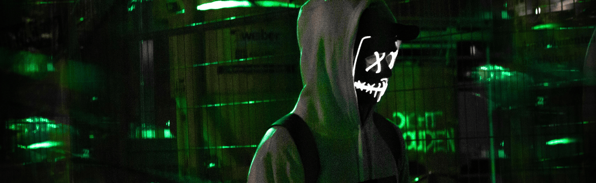 Dramatic image of a disguised hacker representative of the cyber threat to personal wealth. Simpson McCrady.